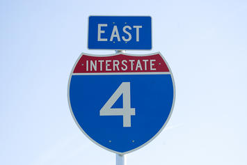 bigstock-Interstate--East-Road-Sign-4971506.jpg
